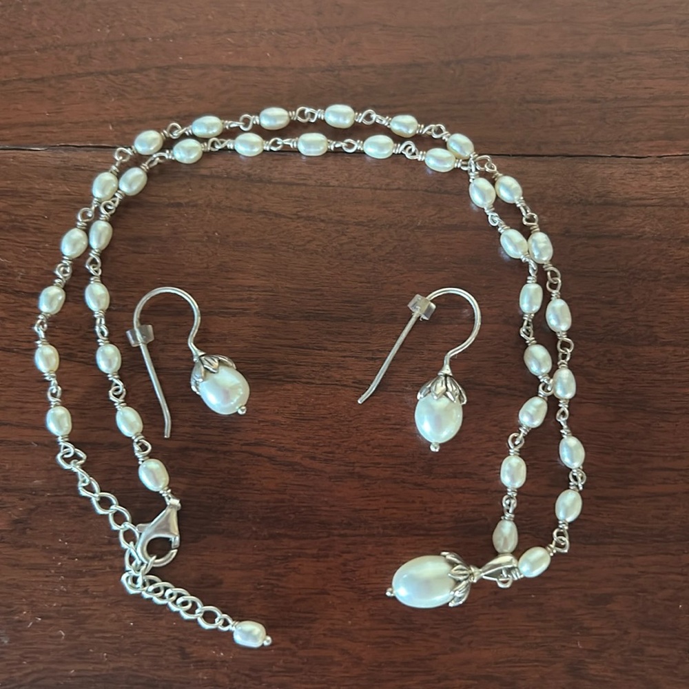 Sundance brand white lotus pearls sterling silver earrings and necklace. Used.